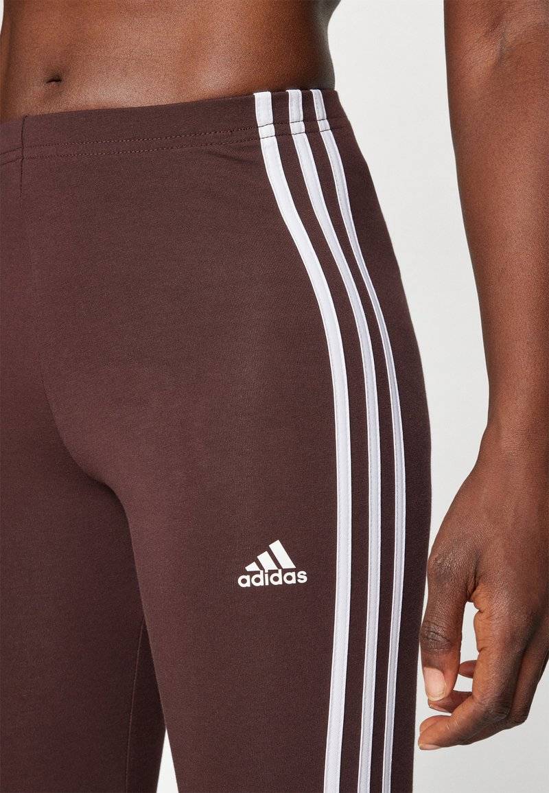 adidas Sportswear adidas Sportswear ESSENTIALS 3 STRIPES HIGH WAISTED - Leggings - shadow brown Räumungsverkauf