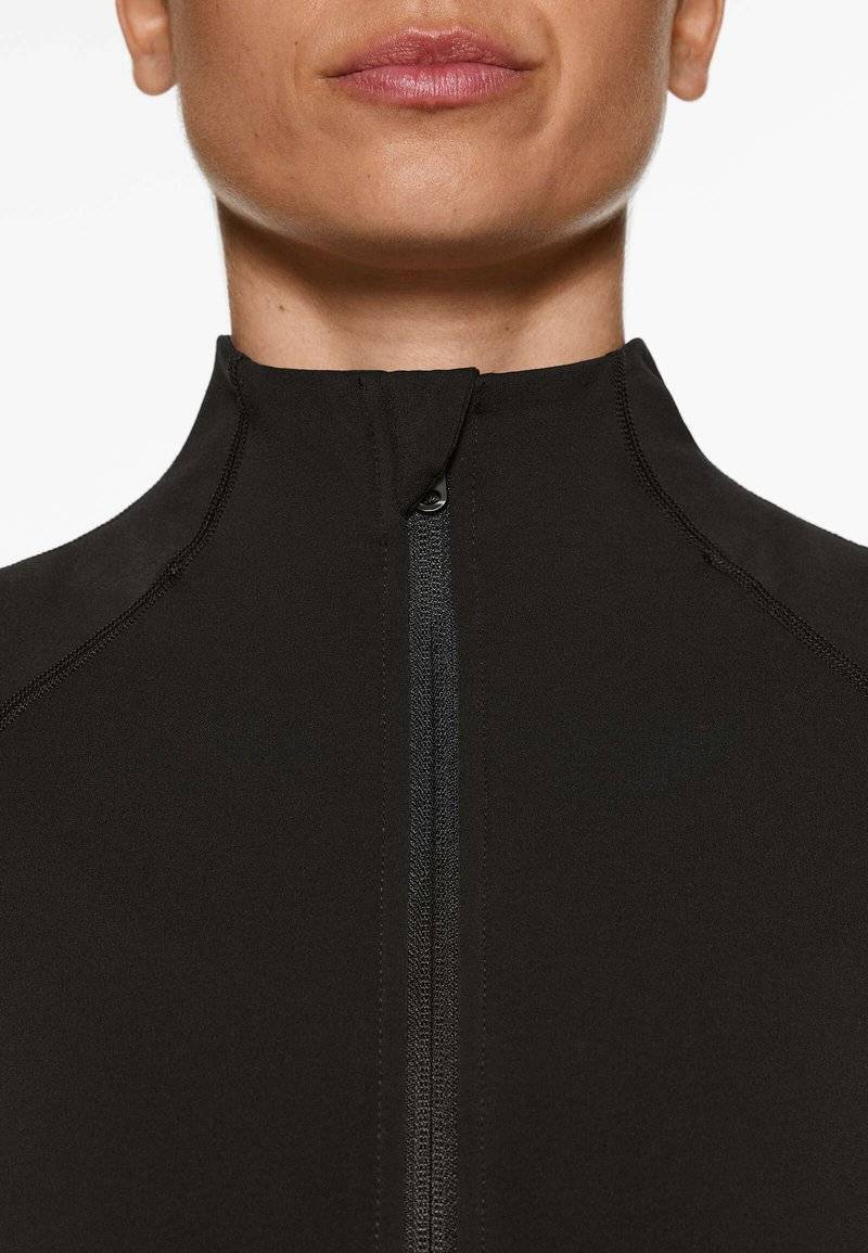 OYSHO OYSHO WARMTH COMFORTLUX TECHNICAL - Training jacket - black Begrenzte Freigabe