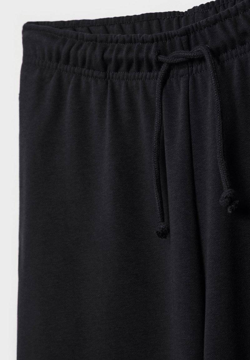 Stradivarius Stradivarius WIDE-LEG JOGGER - Tracksuit bottoms - black Hotsell