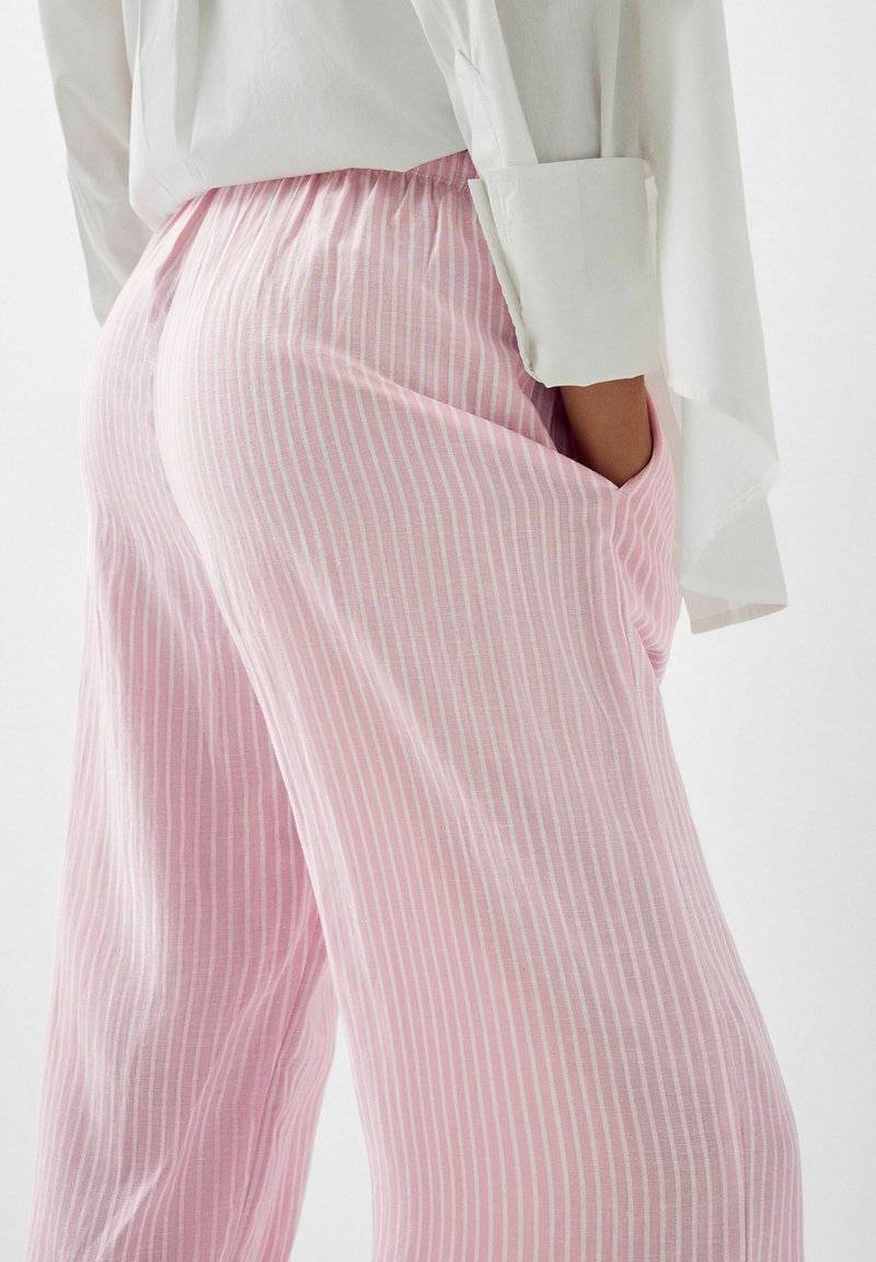 Bershka Bershka WITH AN ELASTIC - Trousers - light pink Auslauf