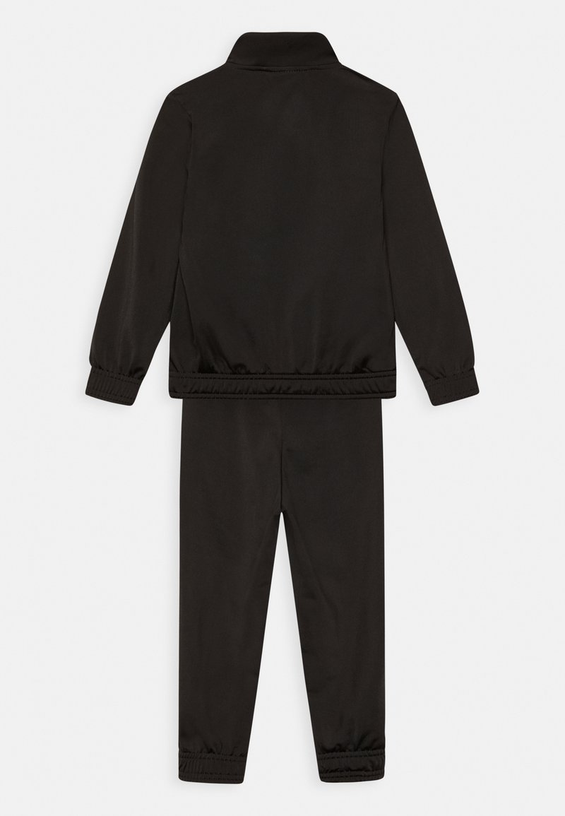 Puma Puma SUIT UNISEX SET - Tracksuit - puma black Fabrikverkauf