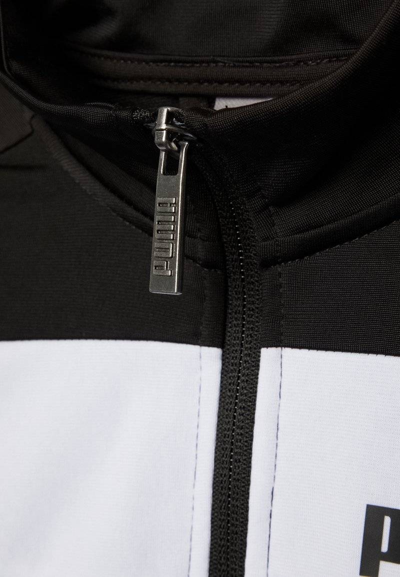 Puma Puma SUIT UNISEX SET - Tracksuit - puma black Fabrikverkauf