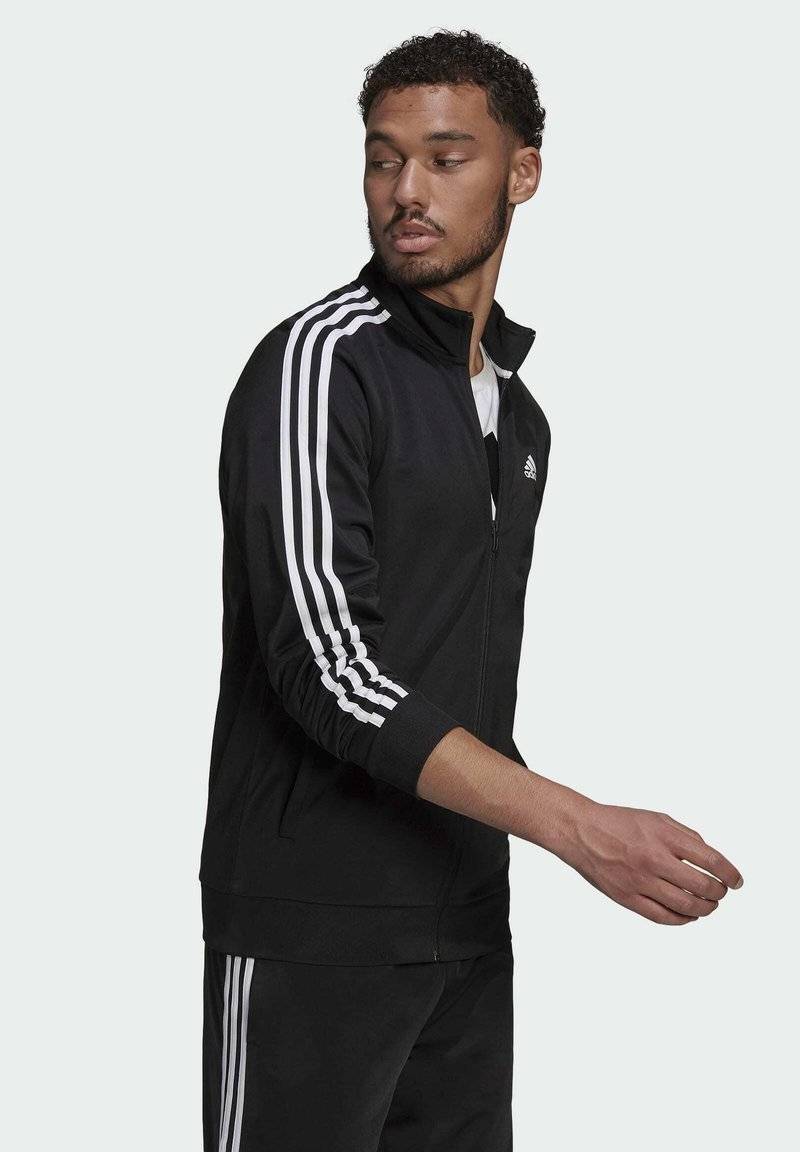 adidas Sportswear adidas Sportswear ESSENTIALS WARM-UP REGULAR 3-STRIPES - Training jacket - black Wochenangebot