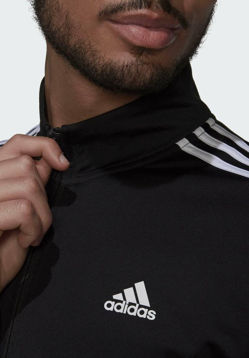adidas Sportswear adidas Sportswear ESSENTIALS WARM-UP REGULAR 3-STRIPES - Training jacket - black Wochenangebot