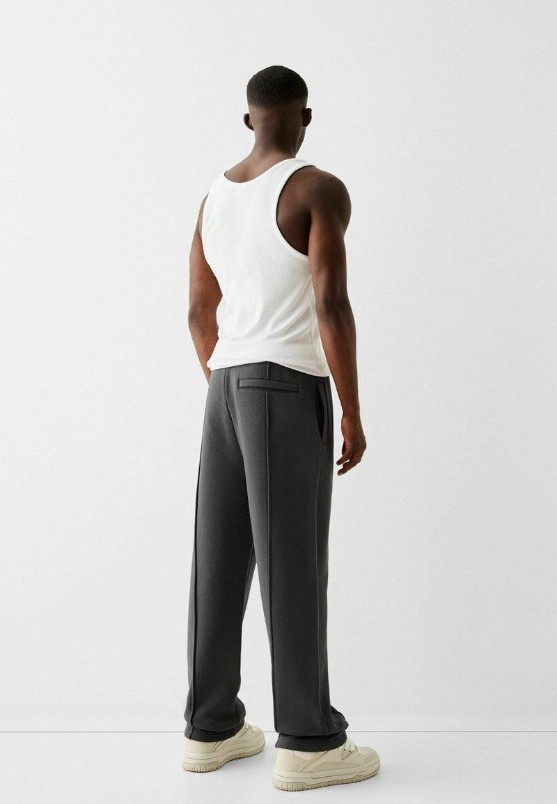 Bershka Bershka WIDE - Tracksuit bottoms - dark grey 2025