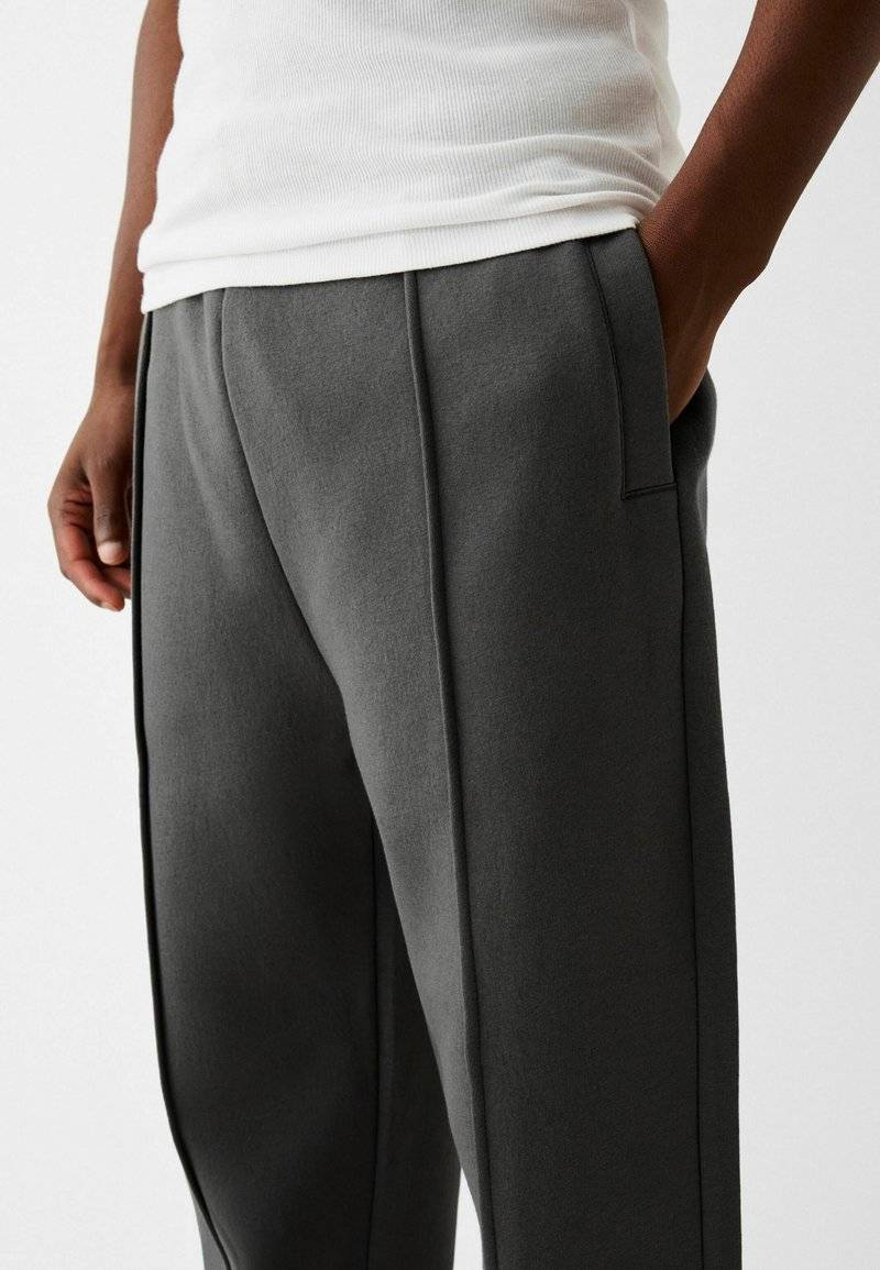 Bershka Bershka WIDE - Tracksuit bottoms - dark grey 2025