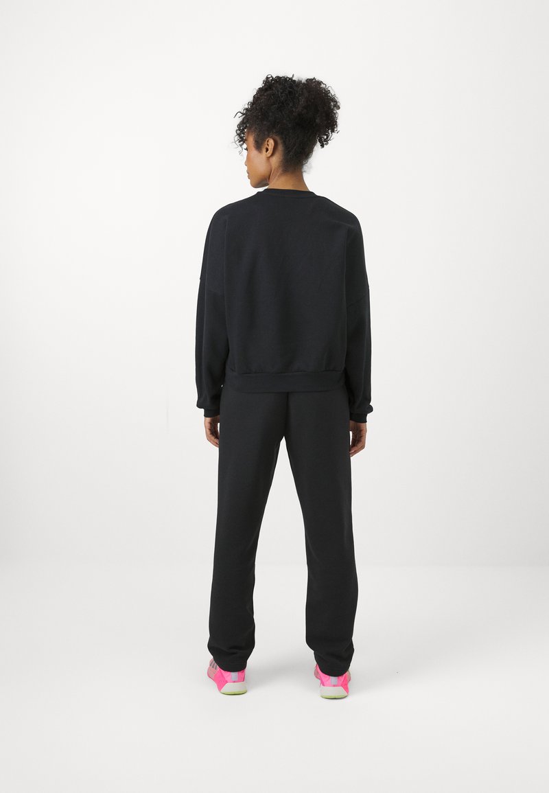 adidas Sportswear adidas Sportswear ESSENTIALS SMALL LOGO FEEL COZY OPEN HEM PANT - Tracksuit bottoms - black Super Rabatt