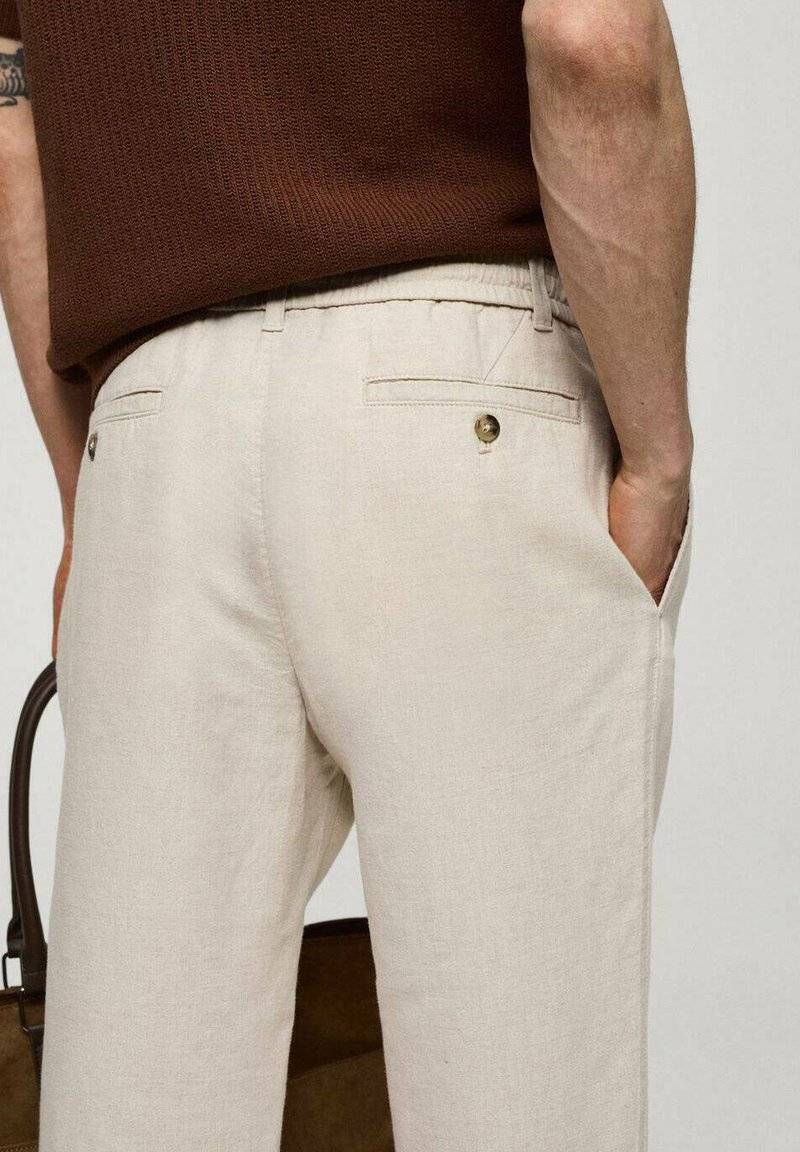 Mango Mango ROMELINO - Trousers - ecru Preisnachlass