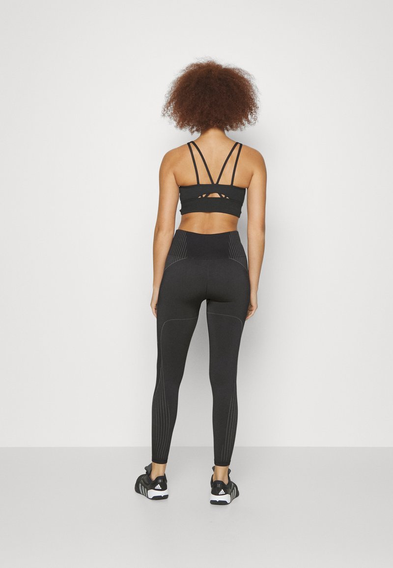 adidas Performance adidas Performance SEAMLESS BRANDED 7/8 - Leggings - black Kostenlose Rückgabe