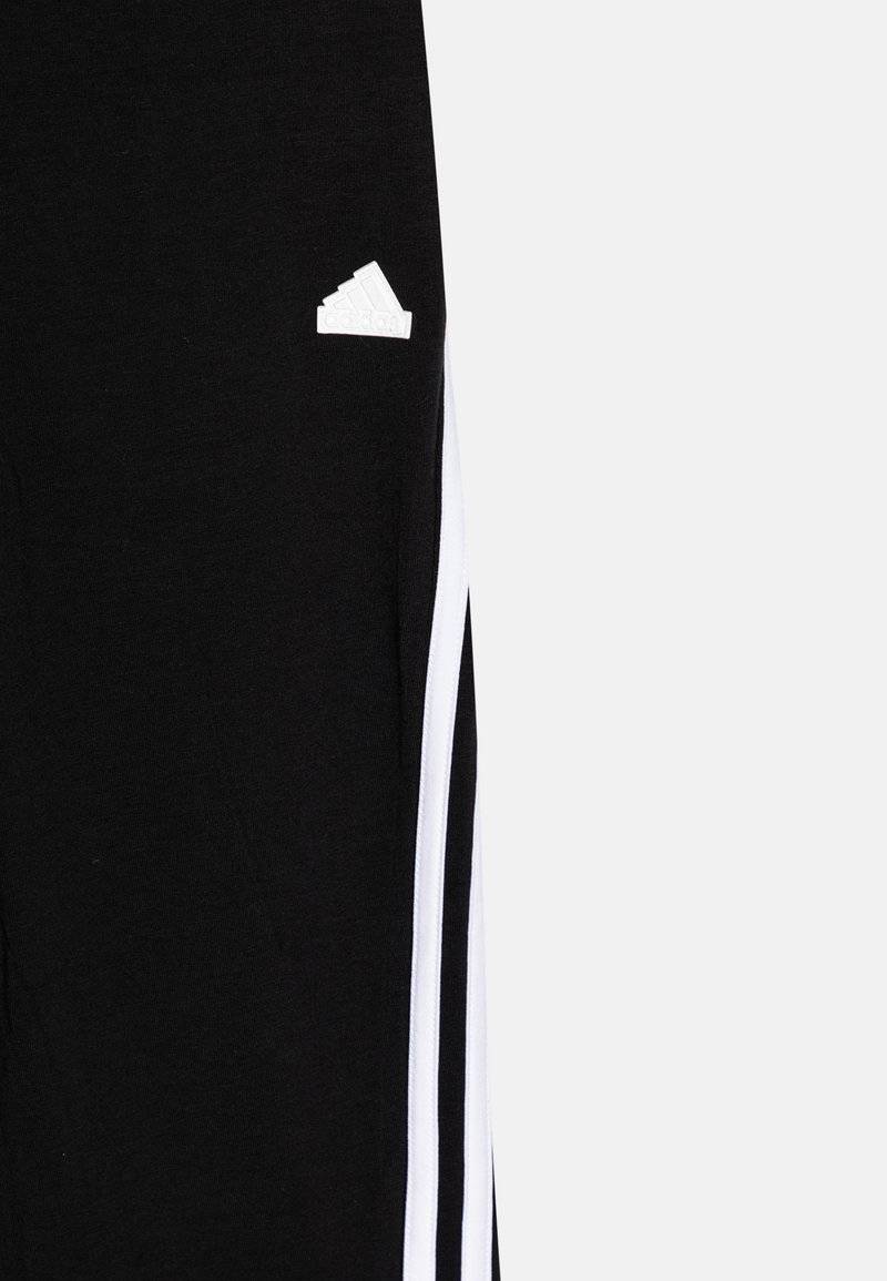 adidas Performance adidas Performance FUTURE ICON 3-STRIPES FLARED - Tracksuit bottoms Letzte 3 Tage