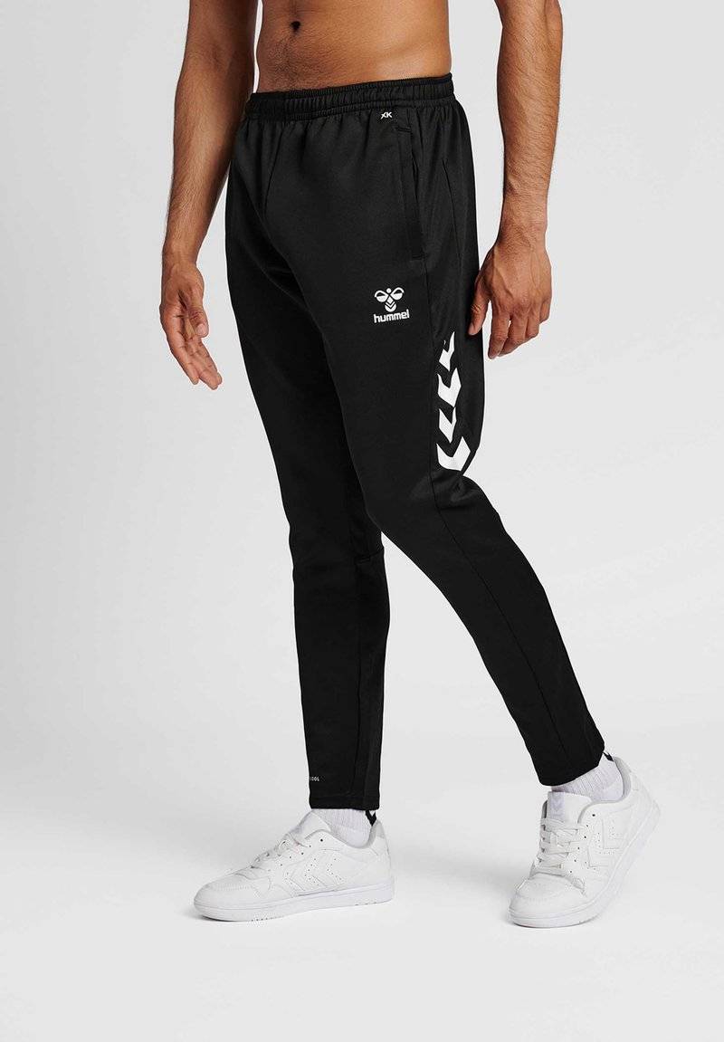 Hummel Hummel CORE XR TRAINING PANTS - Tracksuit bottoms - black Sonderangebot
