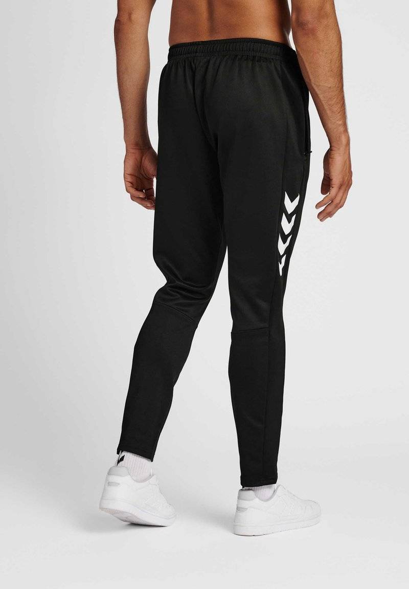 Hummel Hummel CORE XR TRAINING PANTS - Tracksuit bottoms - black Sonderangebot