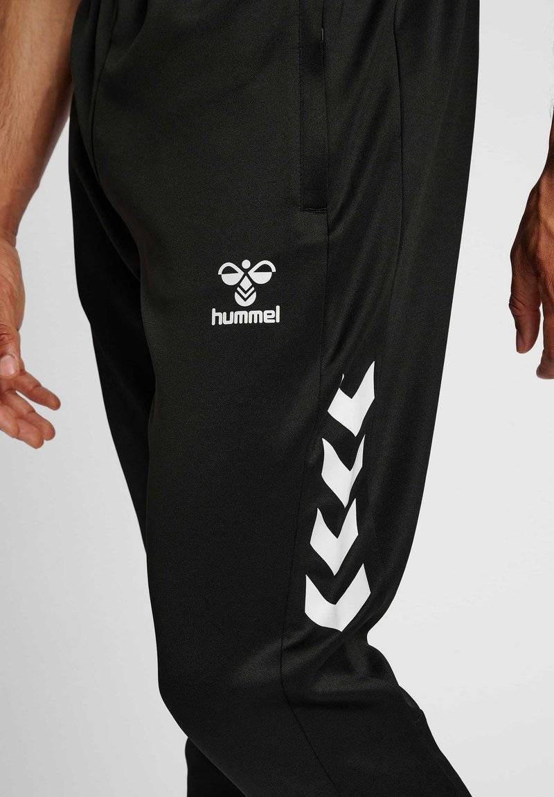 Hummel Hummel CORE XR TRAINING PANTS - Tracksuit bottoms - black Sonderangebot