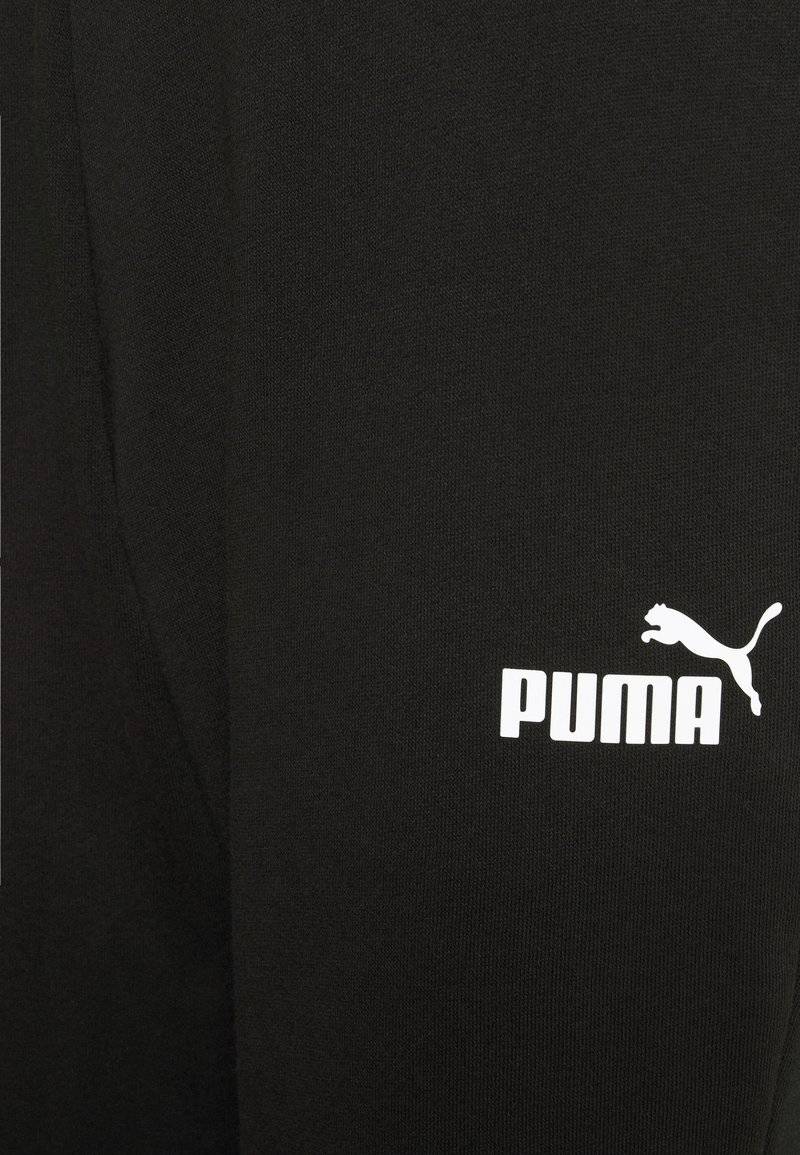 Puma Puma CAPRI - 3/4 sports trousers - black 2025