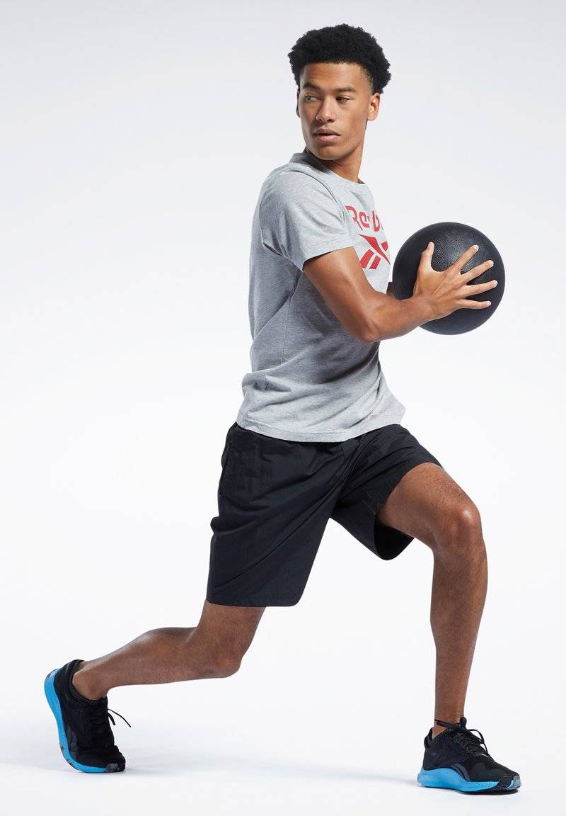 Reebok Reebok ID TRAIN UTILITY - Sports shorts - black Weihnachtsangebot