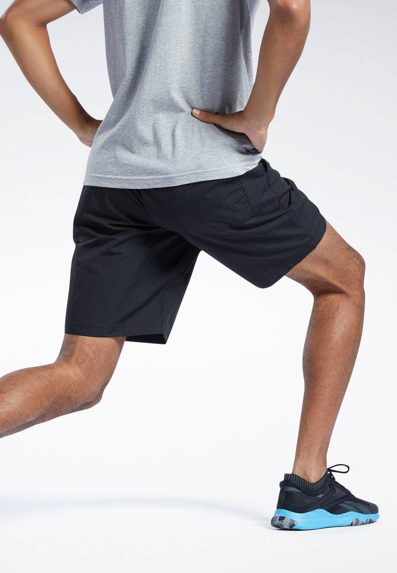 Reebok Reebok ID TRAIN UTILITY - Sports shorts - black Weihnachtsangebot
