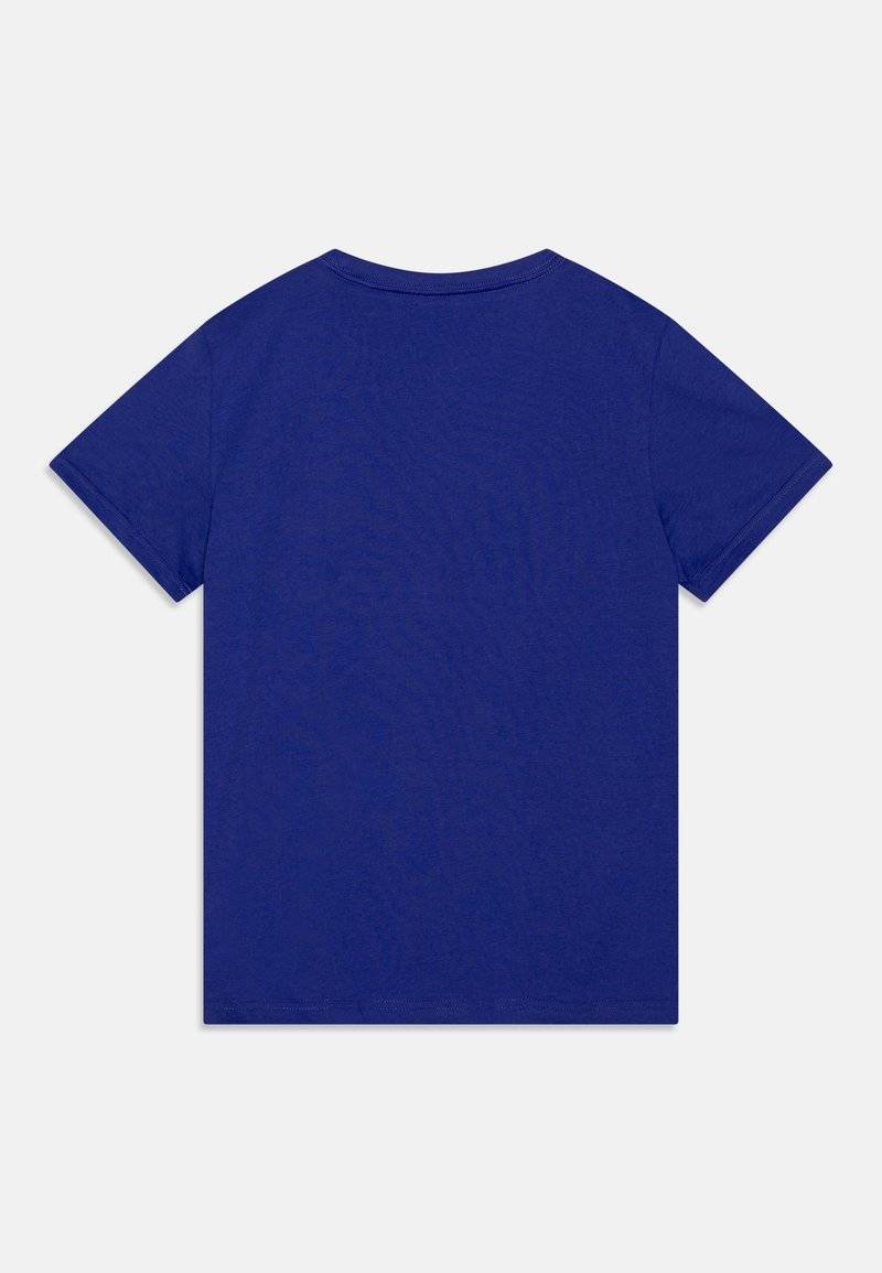 Puma Puma LOGO TEE UNISEX - Print T-shirt - lapis lazuli Vatertagsangebot