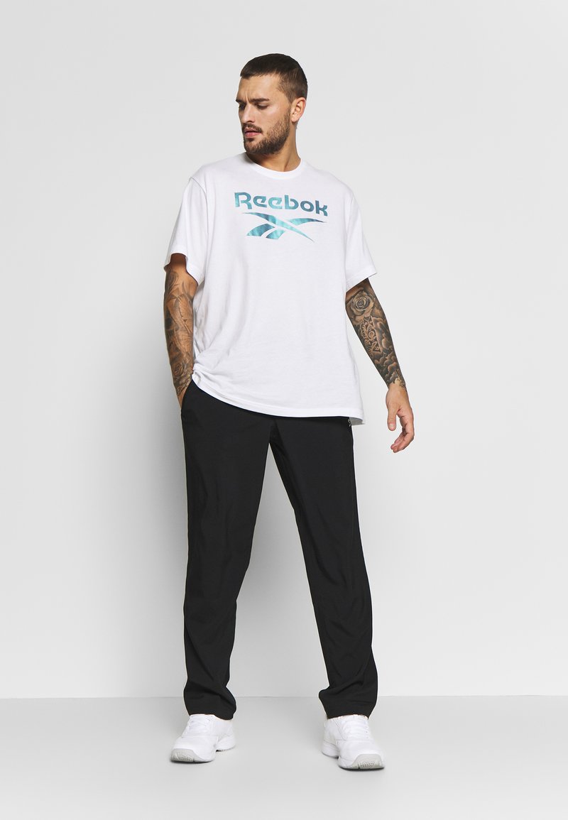Reebok Reebok TRAINING ESSENTIALS WOVEN SPEEDWICK WORKOUT READY - Trousers - black Großer Ausverkauf