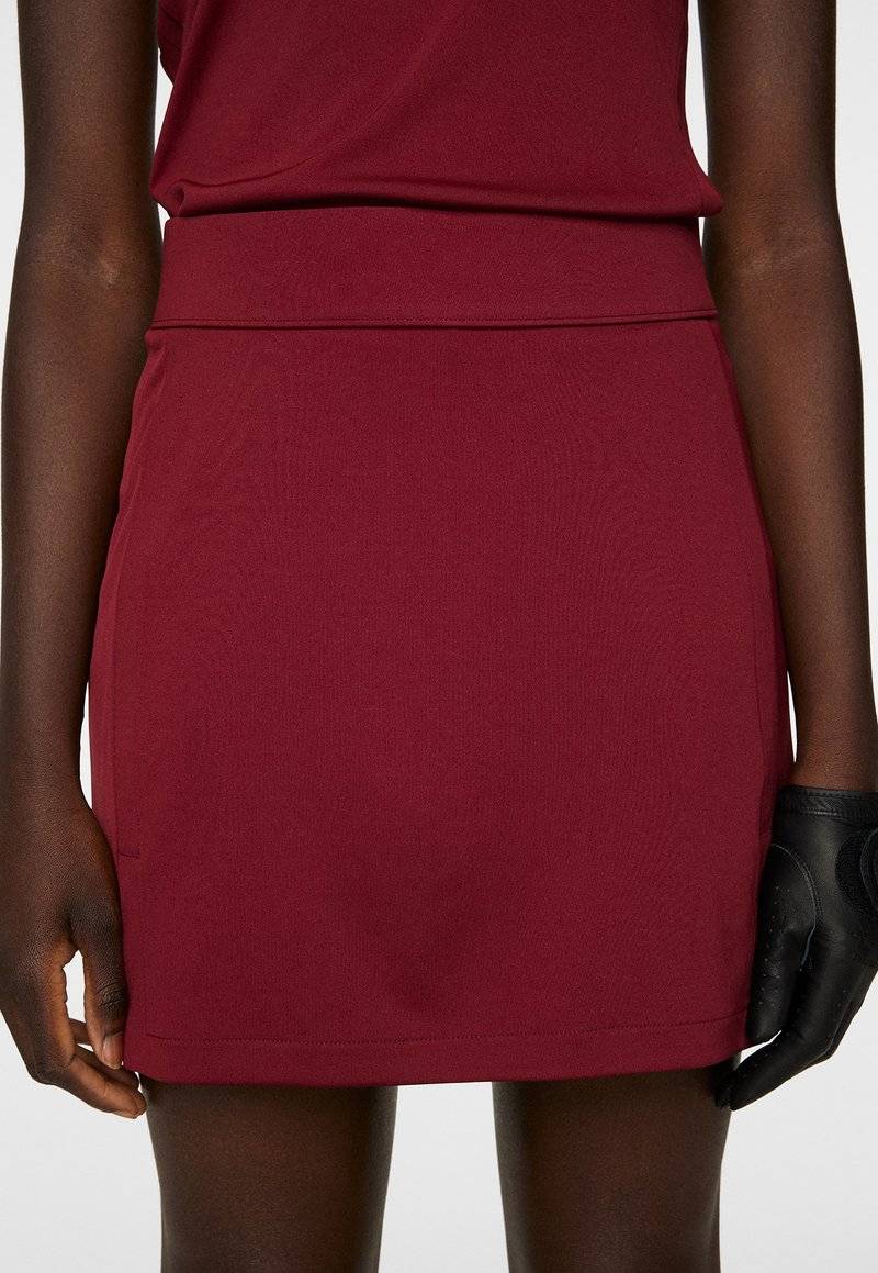 J.LINDEBERG Sports J.LINDEBERG Sports AMELIE MID - Sports skirt - cabernet Online Outlet