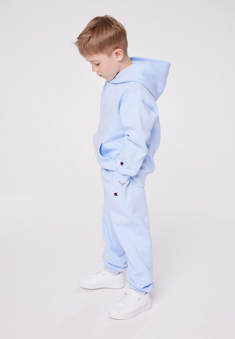 Champion Champion EXCLUSIVE PANT UNISEX - Tracksuit bottoms - light blue