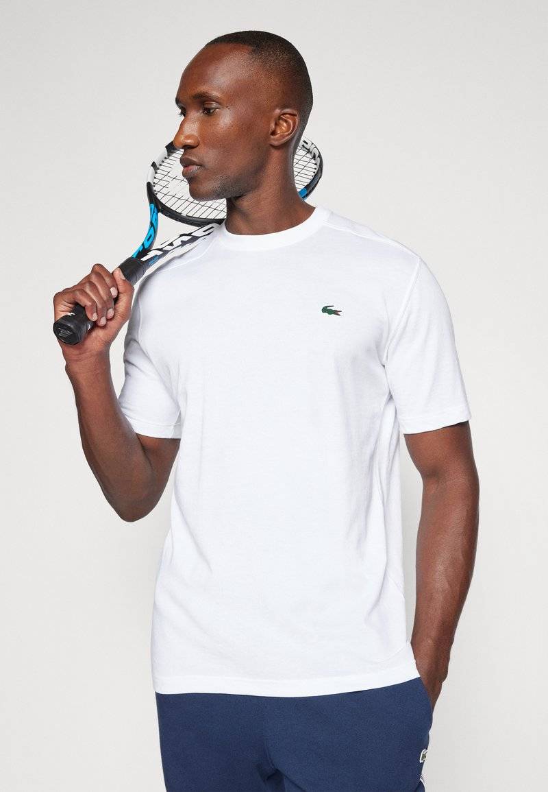 Lacoste Sport Lacoste Sport SPORTS - Basic T-shirt - white Kauf eins, bekomm eins gratis