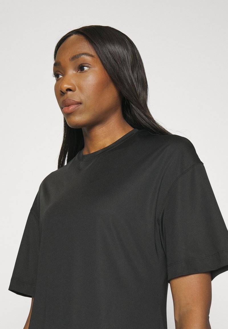 Puma Puma ACTIVEWEAR TEE - Sports T-shirt - black Letzte 3 Tage