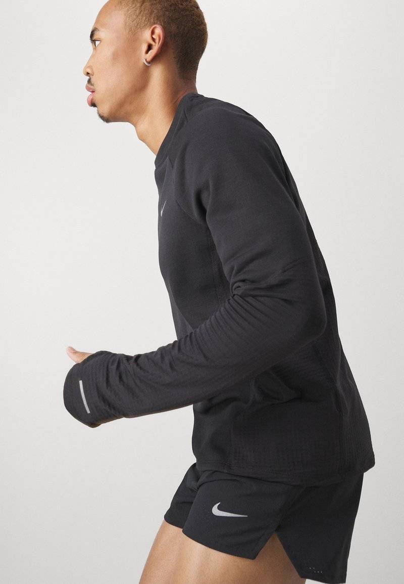 Nike Performance Nike Performance FAST SHORT - Sports shorts Bis zu 50% Rabatt