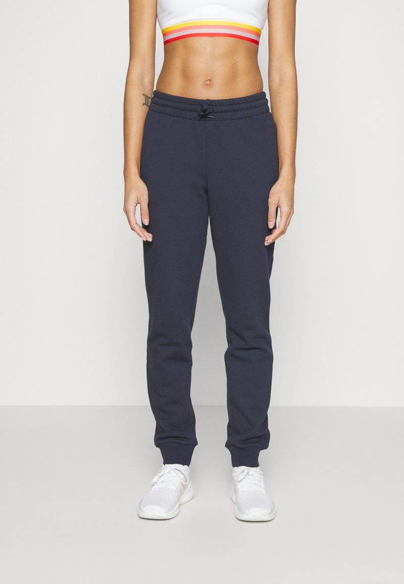 adidas Sportswear adidas Sportswear ESSENTIALS LINEAR CUFFED - Tracksuit bottoms - legend ink