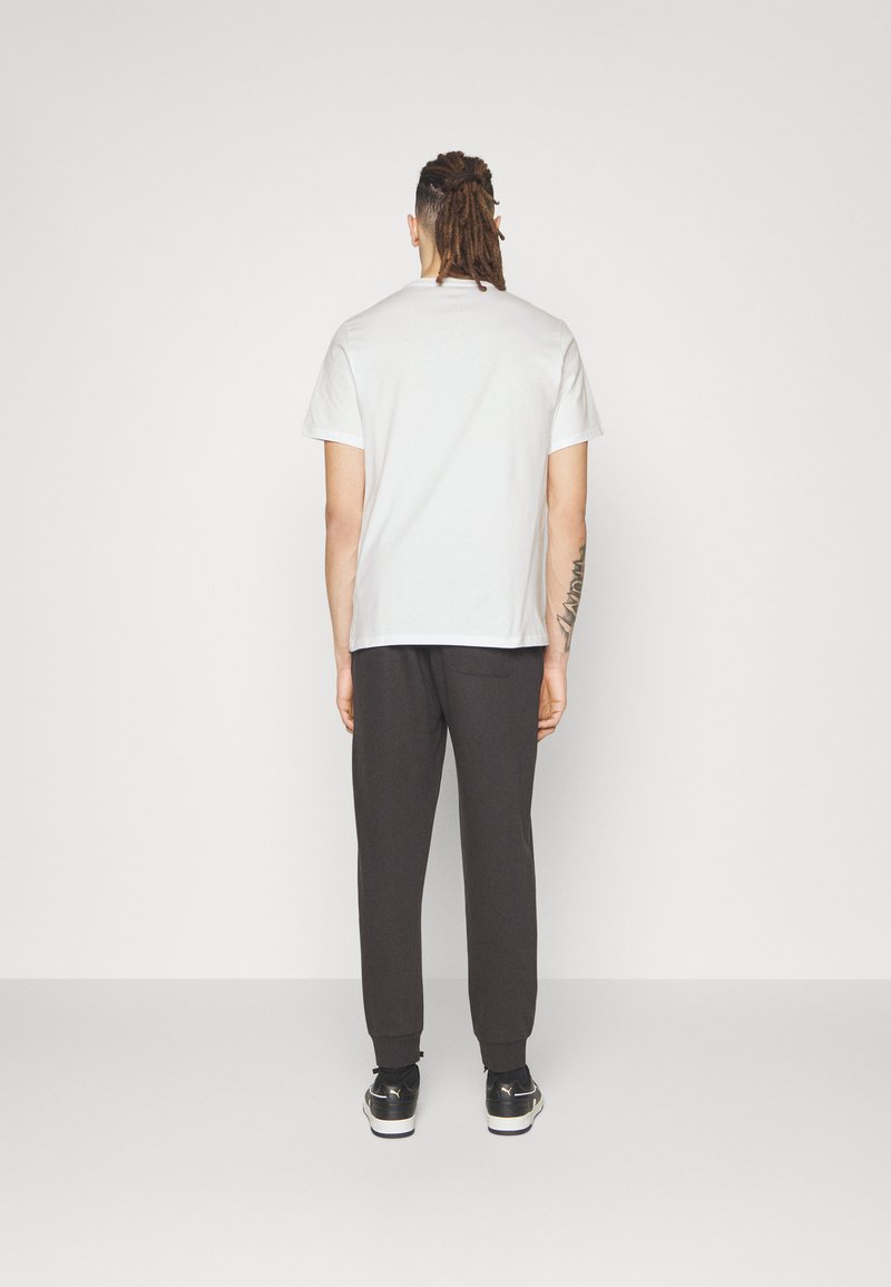 Converse Converse GO TO STAR CHEVRON TEE UNISEX - Print T-shirt - white Kostenloser Versand international