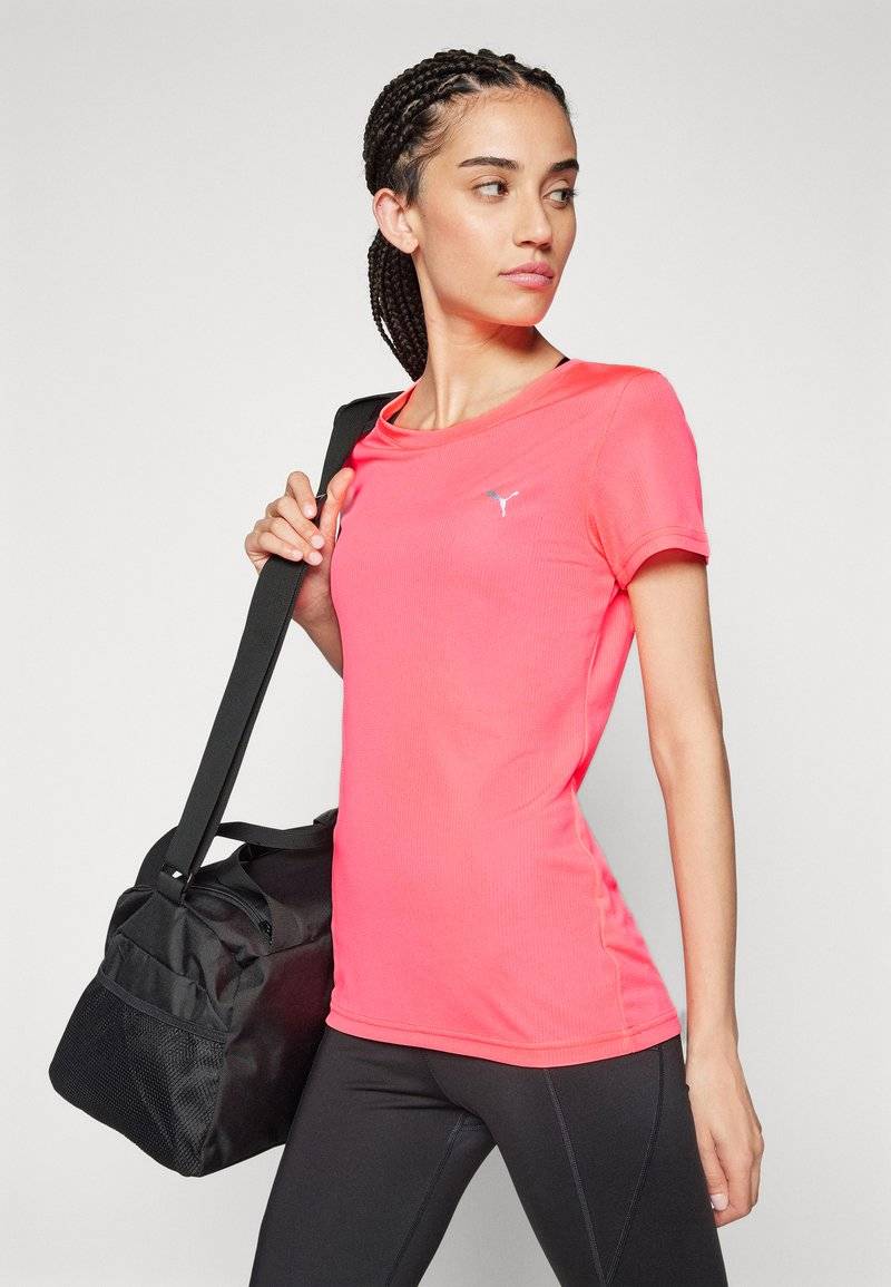 Puma Puma PERFORMANCE TEE - Sports T-shirt - sunset glow im Angebot