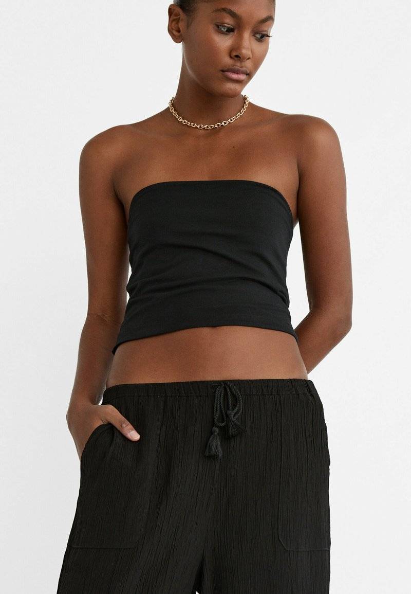 Stradivarius Stradivarius FLOWING CULOTTES - Trousers - black Günstiger Verkauf